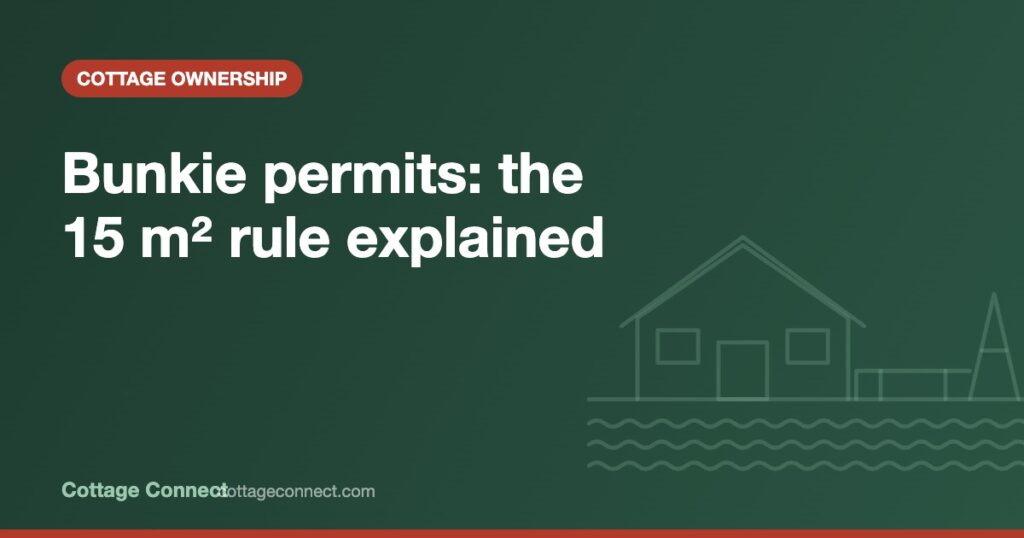 Small wooden bunkie in the trees beside a cottage, illustrating a permit for a bunkie in Ontario
