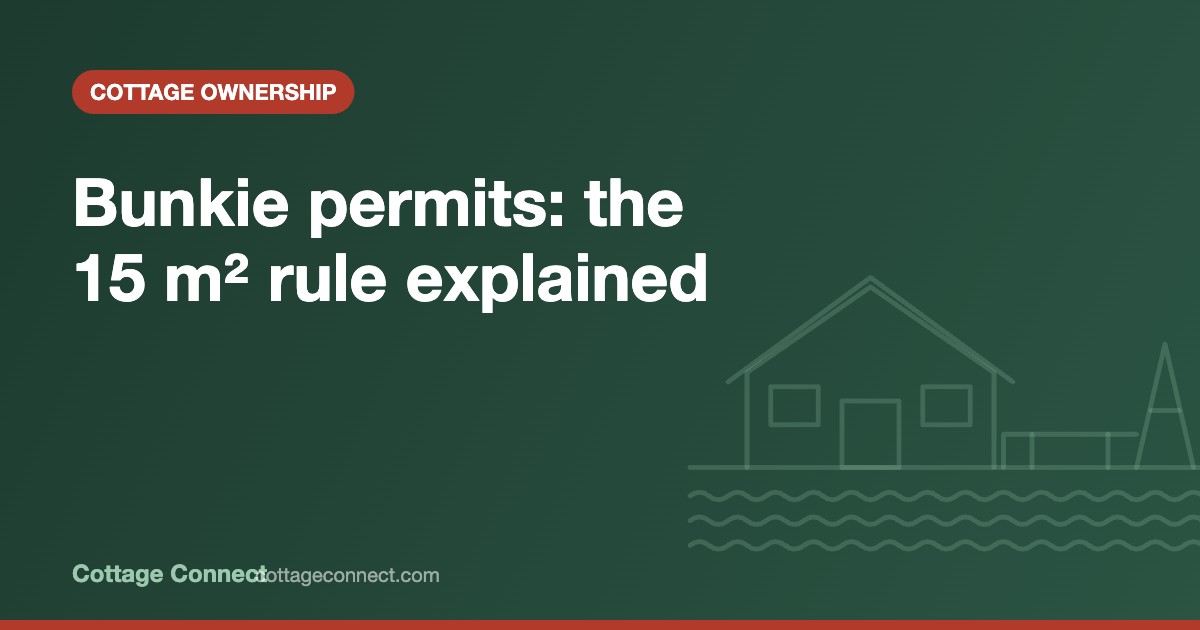 Small wooden bunkie in the trees beside a cottage, illustrating a permit for a bunkie in Ontario